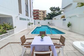 Hotel Axis Inn By GEH Suites