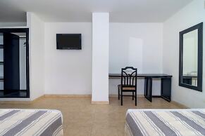 Hotel Axis Inn By GEH Suites