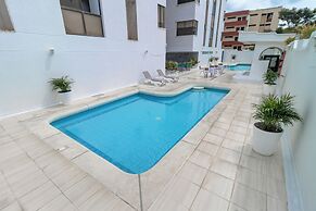 Hotel Axis Inn By GEH Suites