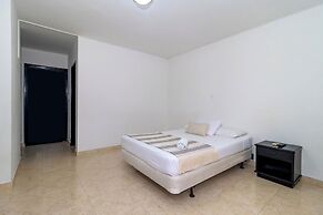 Hotel Axis Inn By GEH Suites