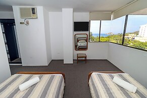 Hotel Axis Inn By GEH Suites