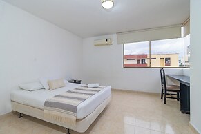 Hotel Axis Inn By GEH Suites