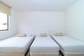 Hotel Axis Inn By GEH Suites