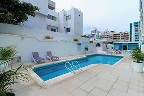 Hotel Axis Inn By GEH Suites