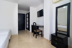 Hotel Axis Inn By GEH Suites