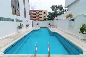 Hotel Axis Inn By GEH Suites