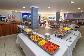 Hotel Axis Inn By GEH Suites