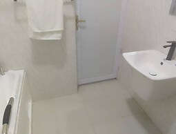 Adenta Oasis Retreat - Spacious 3BR Apartment