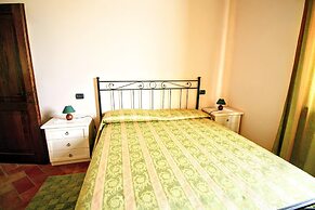 Lovely Farmhouse in Asciano With Swimming Pool