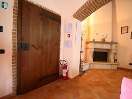 Lovely Farmhouse in Asciano With Swimming Pool