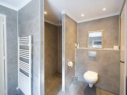 A Detached Bungalow With Outdoor Fireplace, Covered Terrace and Pond i