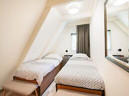 A Detached Bungalow With Outdoor Fireplace, Covered Terrace and Pond i