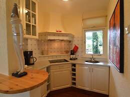 A Detached Bungalow With Outdoor Fireplace, Covered Terrace and Pond i