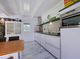 A Detached Bungalow With Outdoor Fireplace, Covered Terrace and Pond i