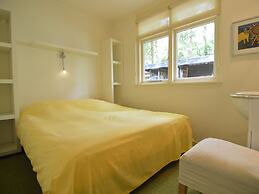 A Detached Bungalow With Outdoor Fireplace, Covered Terrace and Pond i