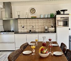 A Detached Bungalow With Outdoor Fireplace, Covered Terrace and Pond i