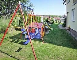 Holiday Home in a Holiday Park Rewal at 600 m From the sea