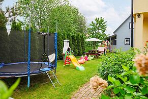 Holiday Home in a Holiday Park Rewal at 600 m From the sea
