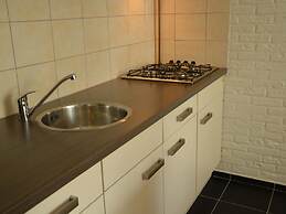 Snug Apartment in Schin op Geul Near Public Pool