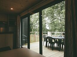 Modernly Furnished Cottage With Beautiful Terrace by a Lake