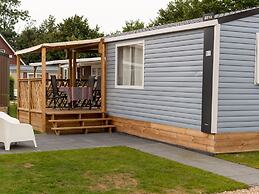 Comfortable Chalet With Microwave, on a Holiday Park 1 km. From the Be