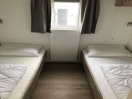 Comfortable Chalet With Microwave, on a Holiday Park 1 km. From the Be