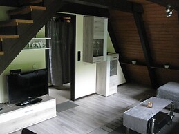 Wooden Bungalow With a Terrace, in a Wooded Area