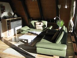 Wooden Bungalow With a Terrace, in a Wooded Area