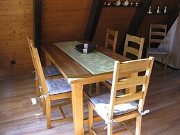 Wooden Bungalow With a Terrace, in a Wooded Area