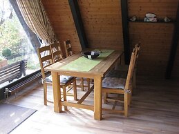Wooden Bungalow With a Terrace, in a Wooded Area