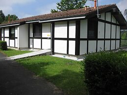 Wooden Bungalow With a Terrace, in a Wooded Area