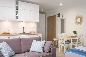 A Comfortable Apartment With a Garden for 2 People, Pobierowo