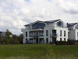 Apartment House Calmsailing, Borgerende