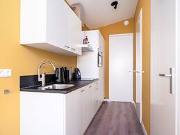 Bungalow With an Outdoor Fireplace by Water