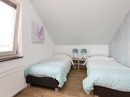 Bungalow With an Outdoor Fireplace by Water