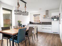 Bungalow With an Outdoor Fireplace by Water