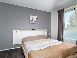 Bungalow With an Outdoor Fireplace by Water