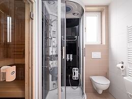 Bungalow With an Outdoor Fireplace by Water