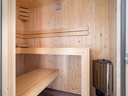 Bungalow With an Outdoor Fireplace by Water