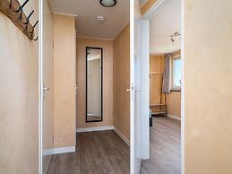 Bungalow With an Outdoor Fireplace by Water