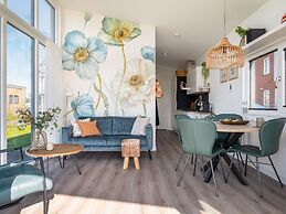 Bungalow With an Outdoor Fireplace by Water