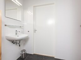 Bungalow With an Outdoor Fireplace by Water