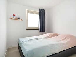 Bungalow With an Outdoor Fireplace by Water