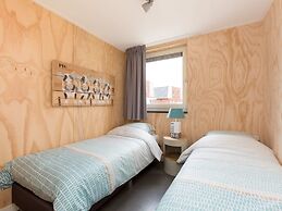 Bungalow With an Outdoor Fireplace by Water