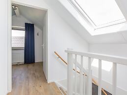 Bungalow With an Outdoor Fireplace by Water