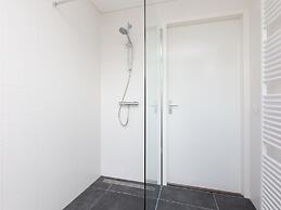 Bungalow With an Outdoor Fireplace by Water