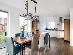 Bungalow With an Outdoor Fireplace by Water