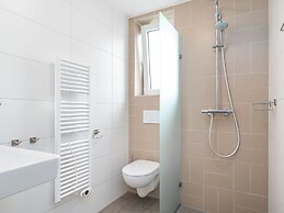 Bungalow With an Outdoor Fireplace by Water