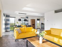 Bungalow With an Outdoor Fireplace by Water