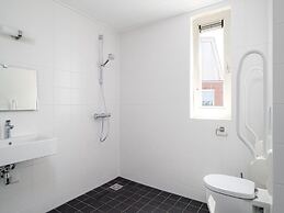 Bungalow With an Outdoor Fireplace by Water